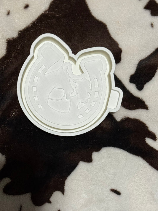 Horse shoe with horse and lady